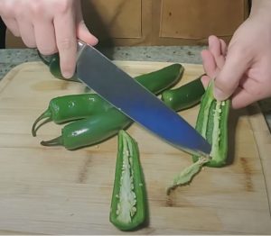 Cutting the Seeds out of the Peppers