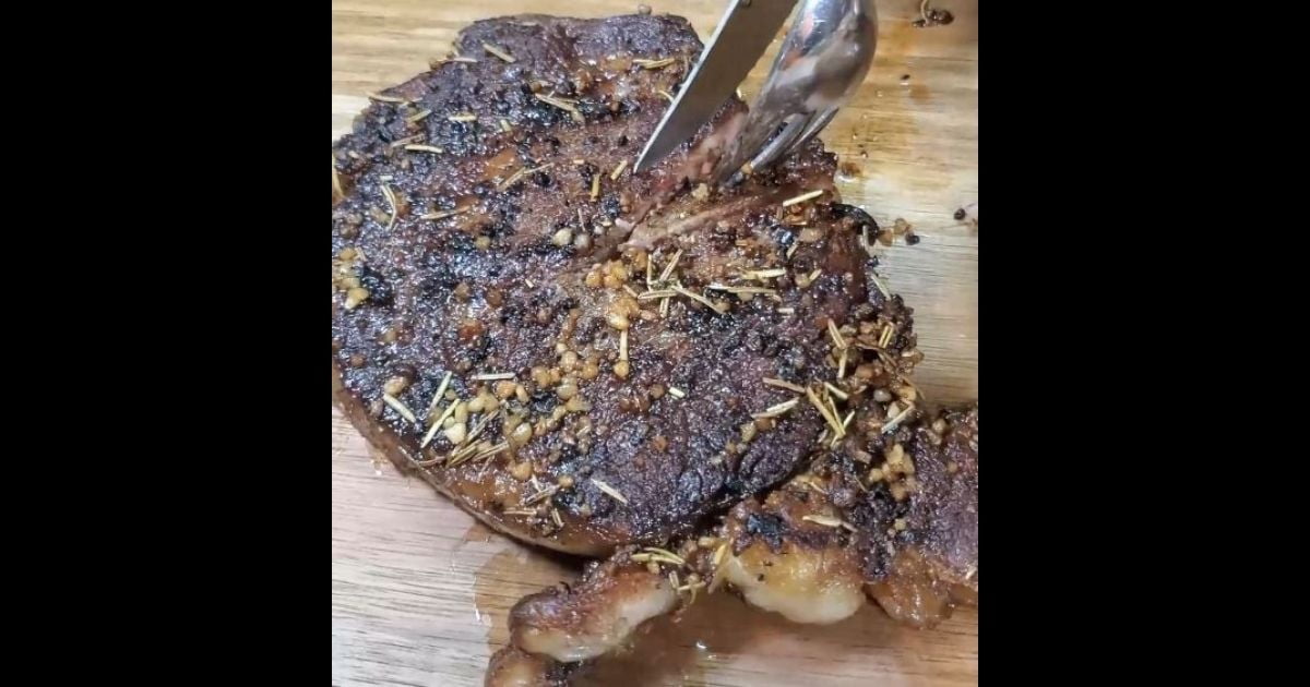 Barbarian Butter Basted Steak being cut by knife