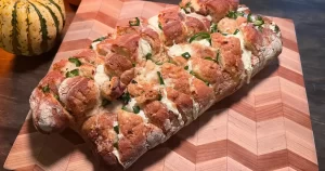 Rustic Jalapeno Garlic Cheese Bread on a board