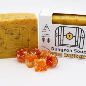 Bars of soap set behind a set of DnD dice