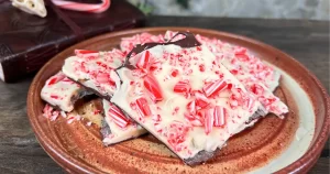 Dancing Fae Peppermint Bark in a pile on a ceramic plate